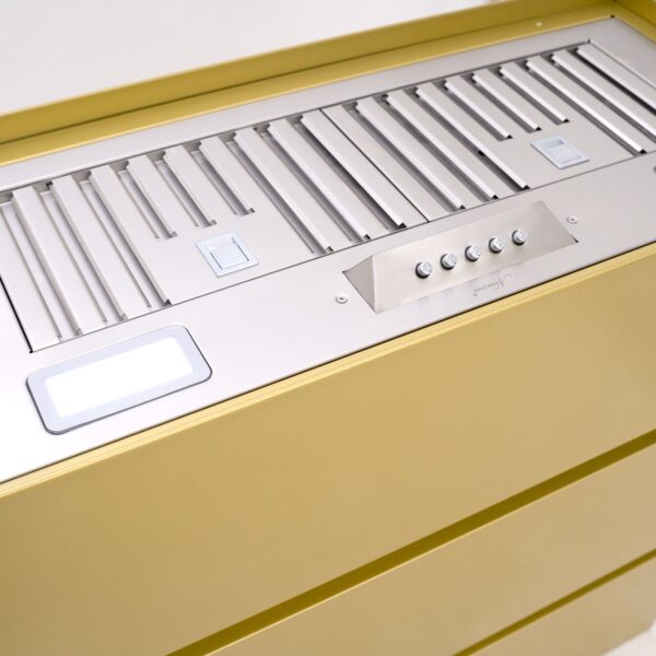 Detailed View: Golden - Toned Range Hood's Control and Ventilation Features