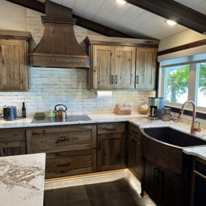 Wood - toned Range Hood in a Well - appointed Kitchen