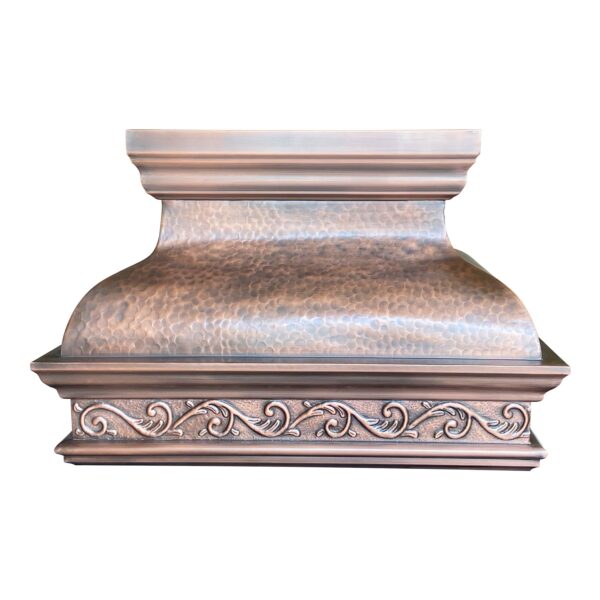 Ornate copper range hood with intricate detailing.