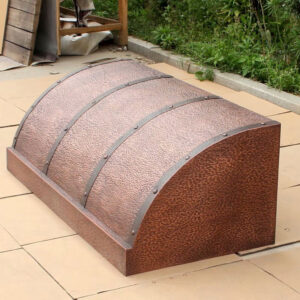 Outdoor Copper - toned Range Hood with a Curved Design